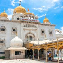 a large building with gold domes on top of it