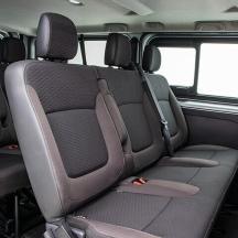 an empty seat in the back of a van