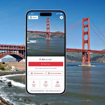 a cell phone taking a picture of a bridge