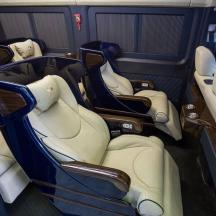 a group of seats in the back of a car