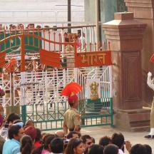 a group of people watching a performance in front of a crowd