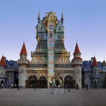 a large building with a tower in front of it