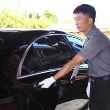 a man is getting out of a car