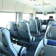 a bus with empty seats on a bus