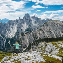 a person standing on top of a mountain