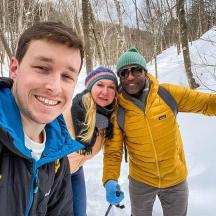a group of people on skis in the snow