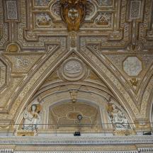 an ornate ceiling of a building with paintings on it