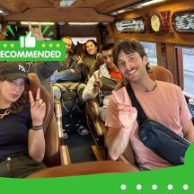a group of people sitting on a train