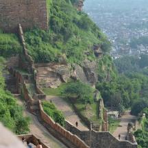 a view of the great wall of china on a mountain