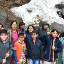a group of people are posing for a picture