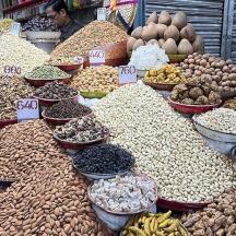a market with many different types of nuts and fruits