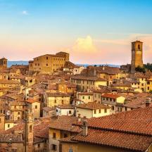 a cityscape of a town with houses and buildings