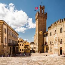 a group of buildings with a clock tower