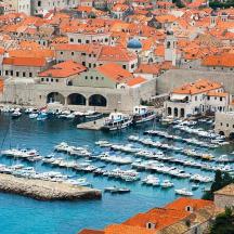 a group of boats are docked in a harbor