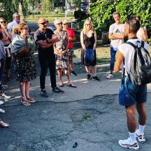 a group of people standing around in a crowd