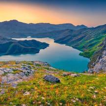 a view of a lake in the mountains
