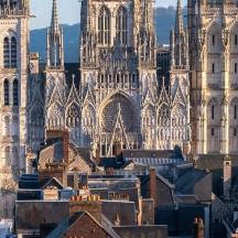 an image of a cathedral with buildings in front of it