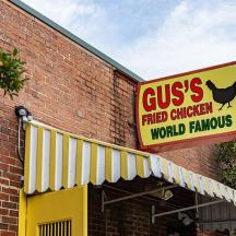 a sign for a red chicken world famous restaurant