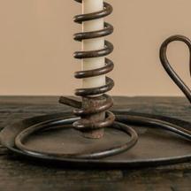 a metal coil sitting on top of a table