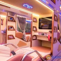 an inside view of an rv with purple lighting
