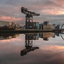 a view of a city with a reflection in the water