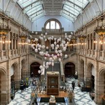 a large lobby with a large chandelier in a building