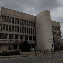 a large building on the side of a street