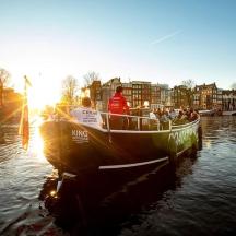 a group of people on a boat in the water