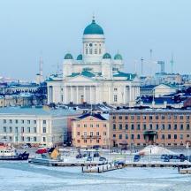 a view of a city with a large building