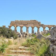 ancient ruins of a building on a hill