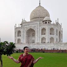 a woman standing in front of a building