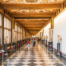 a hallway in the louvre museum with statues