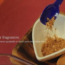 a spoonful of food in a bowl on a table
