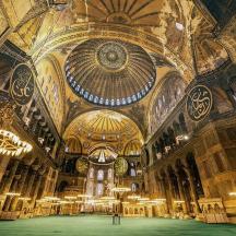 a large room with a large building with a domed ceiling