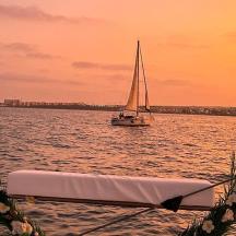 a boat in the water with a sail boat