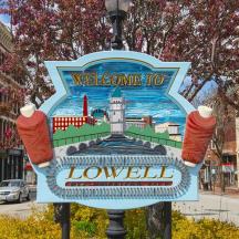 a welcome to louwell sign on a street