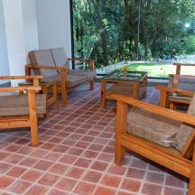 a group of chairs and tables on a patio