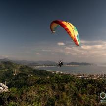 a person para sailing in the air with a parachute
