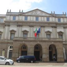 a building with two flags in front of it