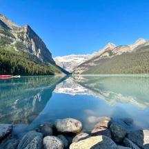a view of a lake with mountains in the background