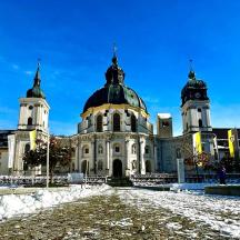 a large building with two domes on top of it