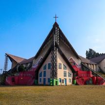 a church with a cross on the front of it