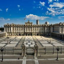 a large building with a courtyard in front of it