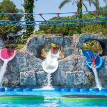 a water park with three slides in the water