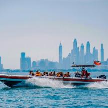 a group of people on a boat in the water