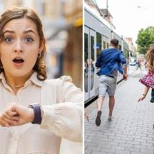 o femeie care arată spre ceas și oameni care merg pe stradă