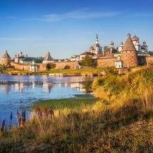 a view of a city with a river and buildings