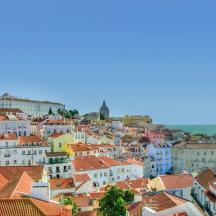 a view of a city with houses and roofs