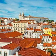 a view of a city with red roofs