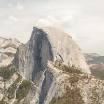 a large waterfall in the middle of a mountain